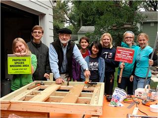 Dick Tuttle poses with OYBC members Sarah, Jacob, Sarah, Clare, Emily, Allison, and Kat, along with their osprey platform. Missing from photo: Nick